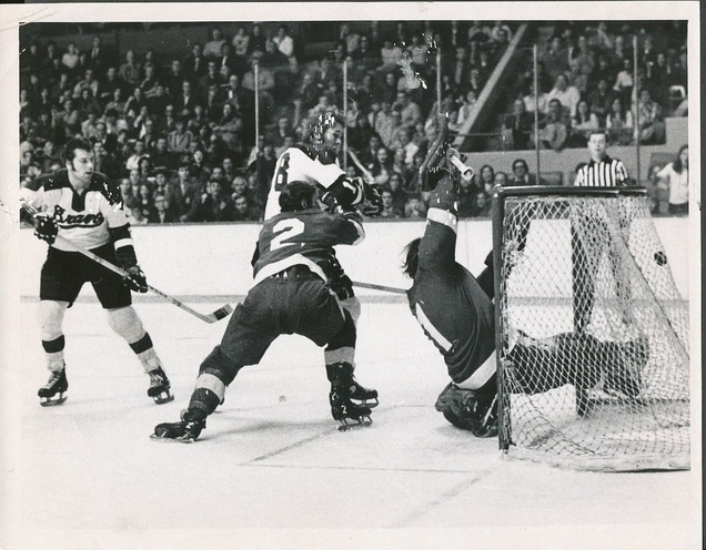 Don Marcotte, on an AHL conditioning stint with the Boston Braves, scores his first Braves goal vs. Tidewater and goalie Andy Brown.  Dec 14, 1971 (Ray Lussier)
